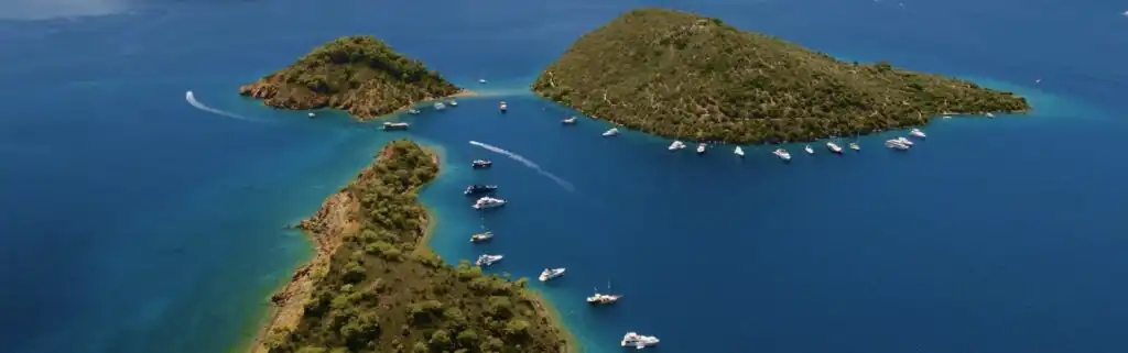 Boats moored up around a Turkish island